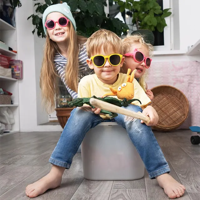 three kids playing in a basket